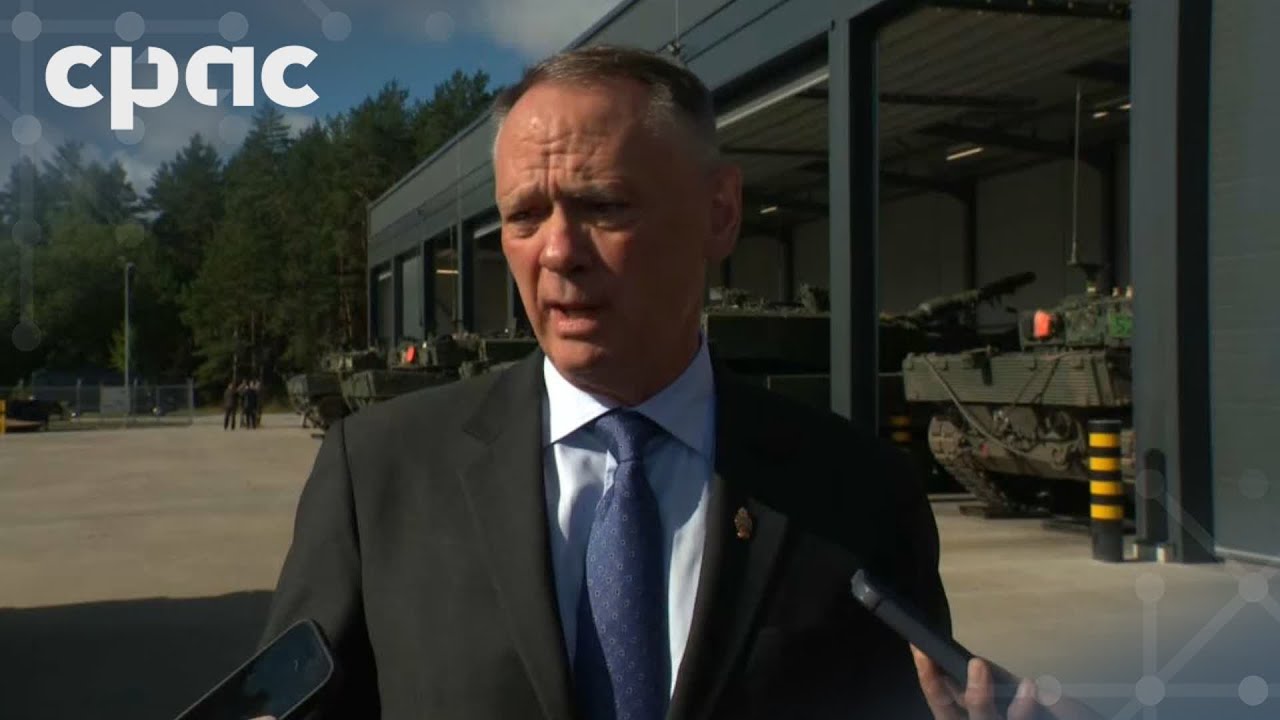 Minister David McGuinty speaks with reporters in Riga – August 27, 2025